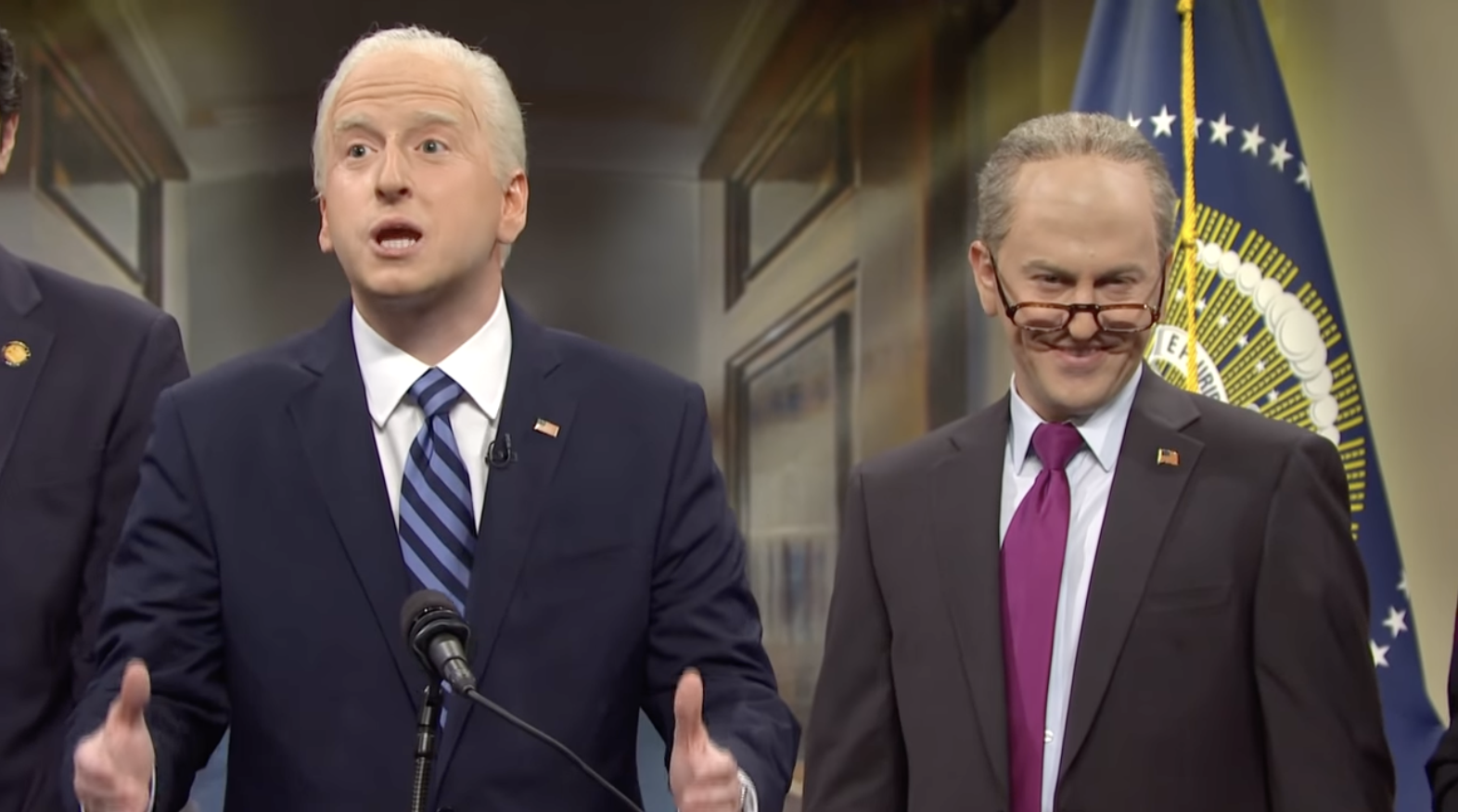 Two comedians impersonating President Joe Biden and Senator Chuck Schumer on Saturday Night Live.