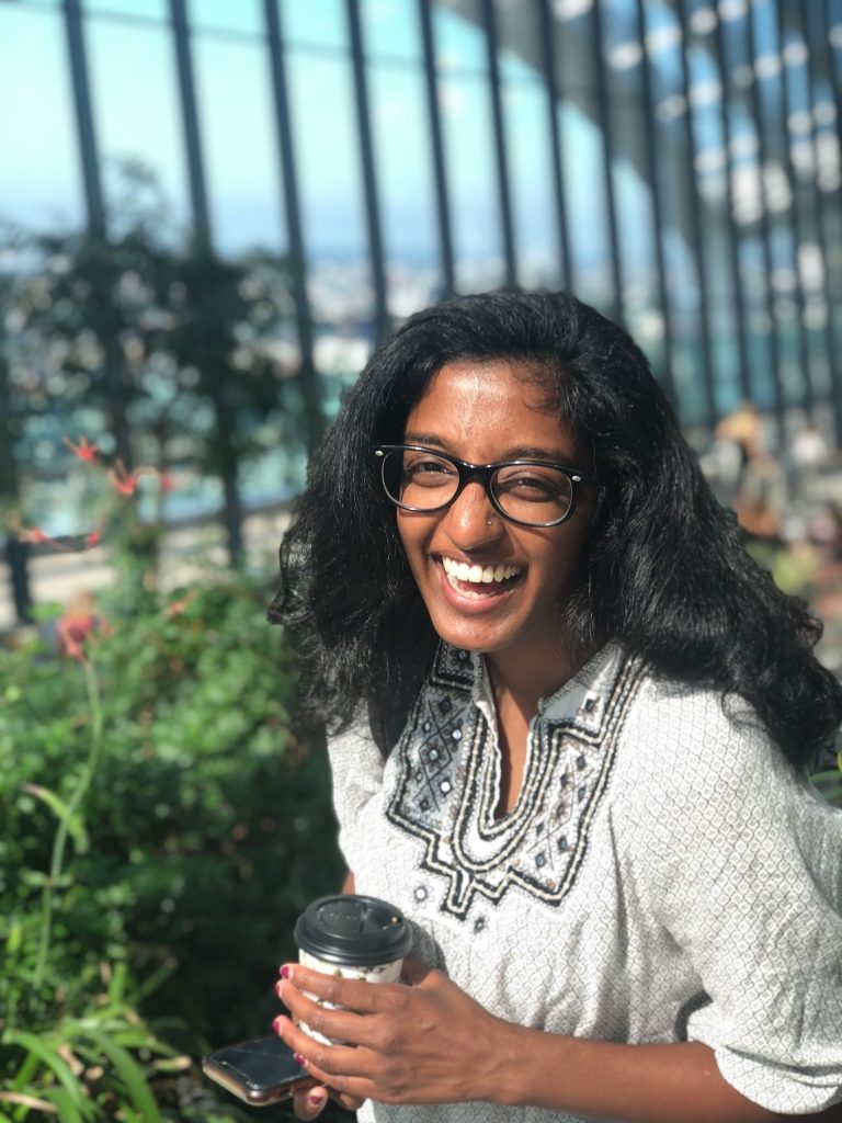 Blue State's strategist, Sweta Maru, laughing